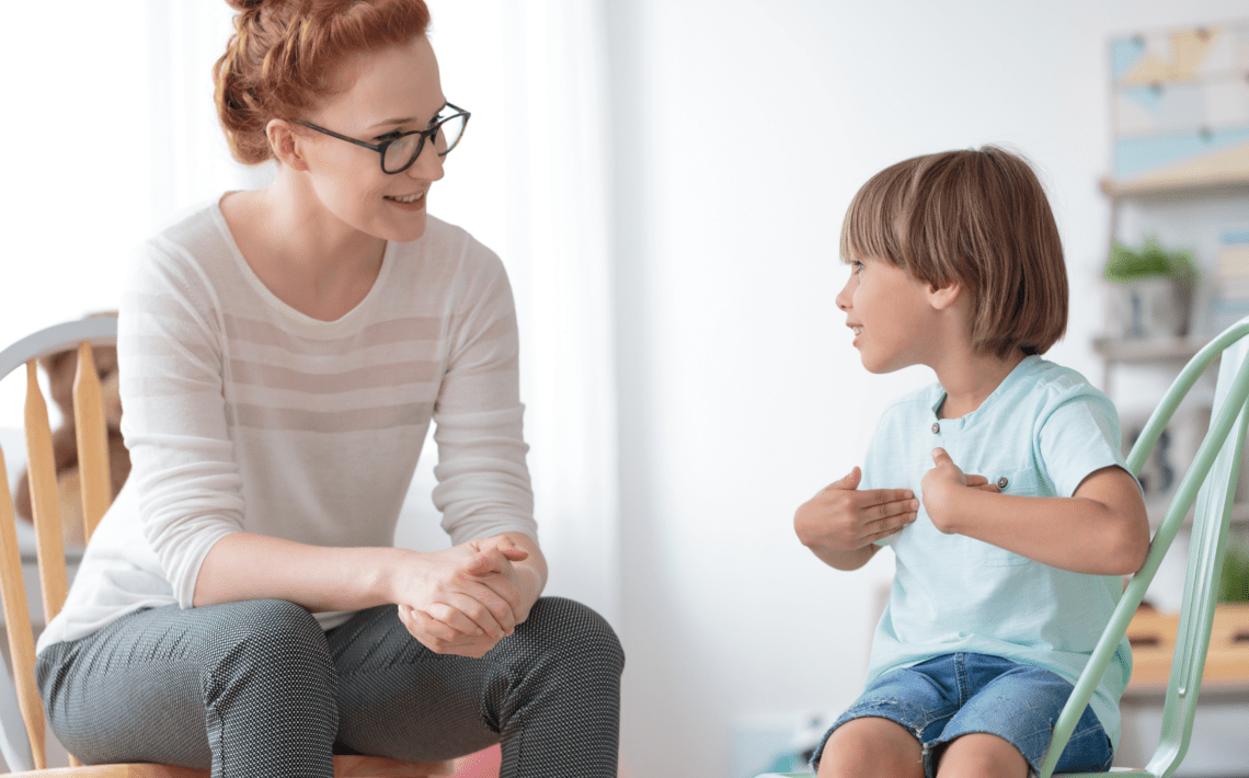 mother helping child to develop phonological awareness activities