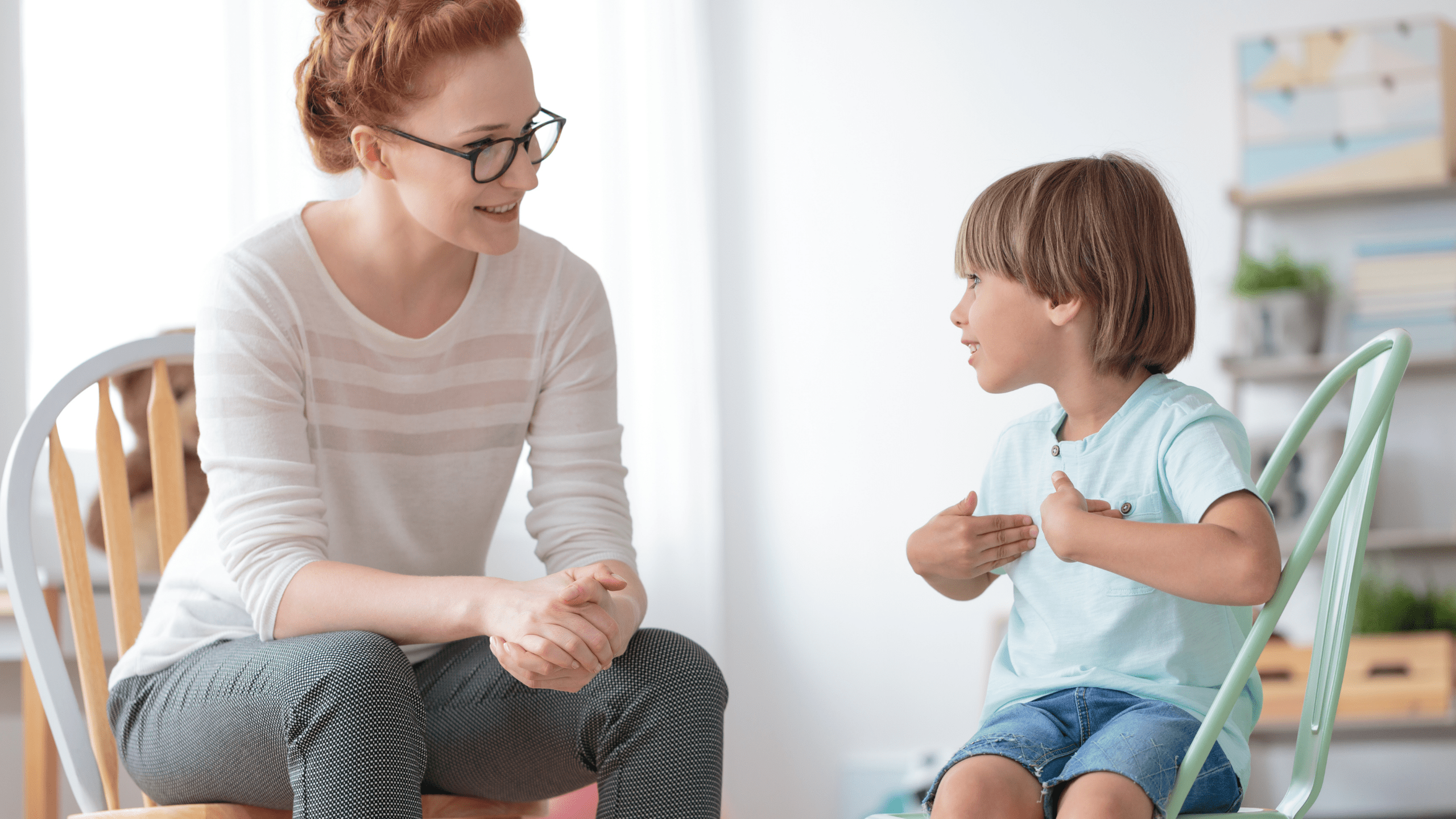 mother helping child to develop phonological awareness activities