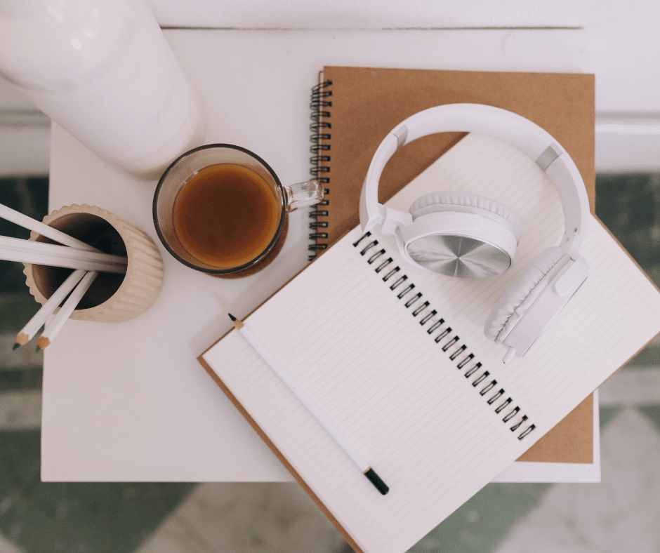 A collection of study related material in autumnal colours of white and brown and beige